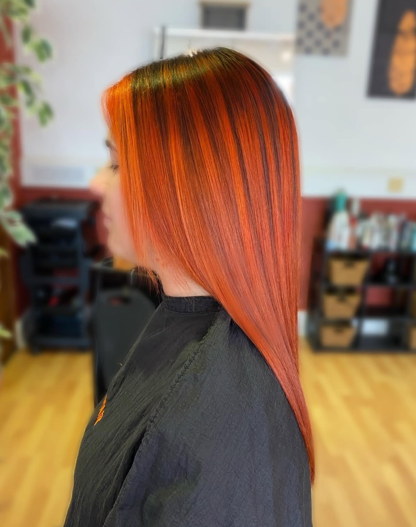 Woman with long vibrant orange hair